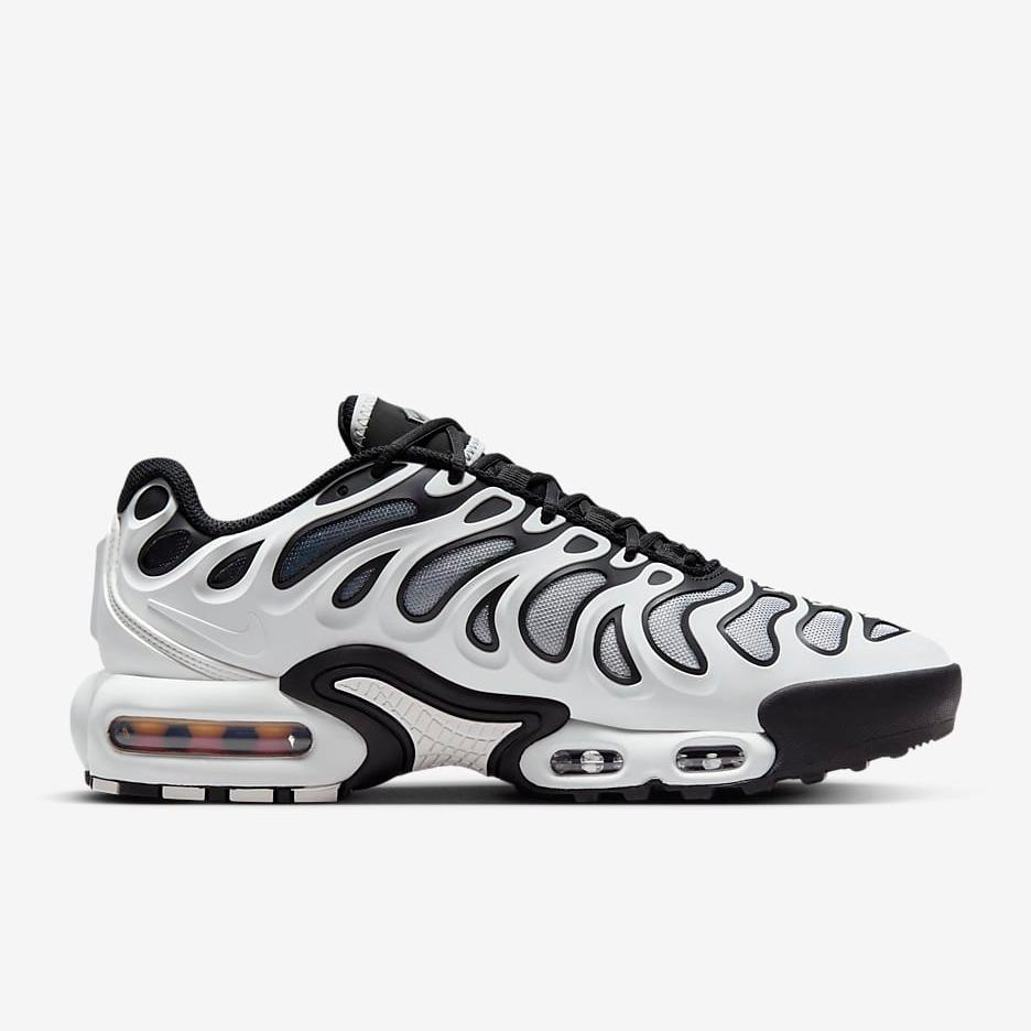 Side view of Nike Air Max Plus Drift in Black and White – Showcasing the sleek mesh upper and TPU overlays.